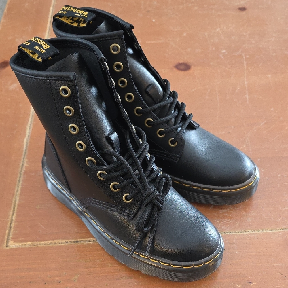 Dr. Martens Black Leather Boots with Gold Accents